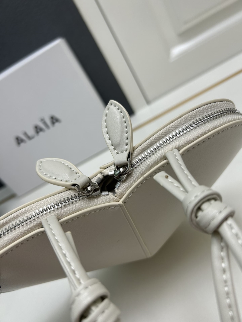 Alaia Round Bags